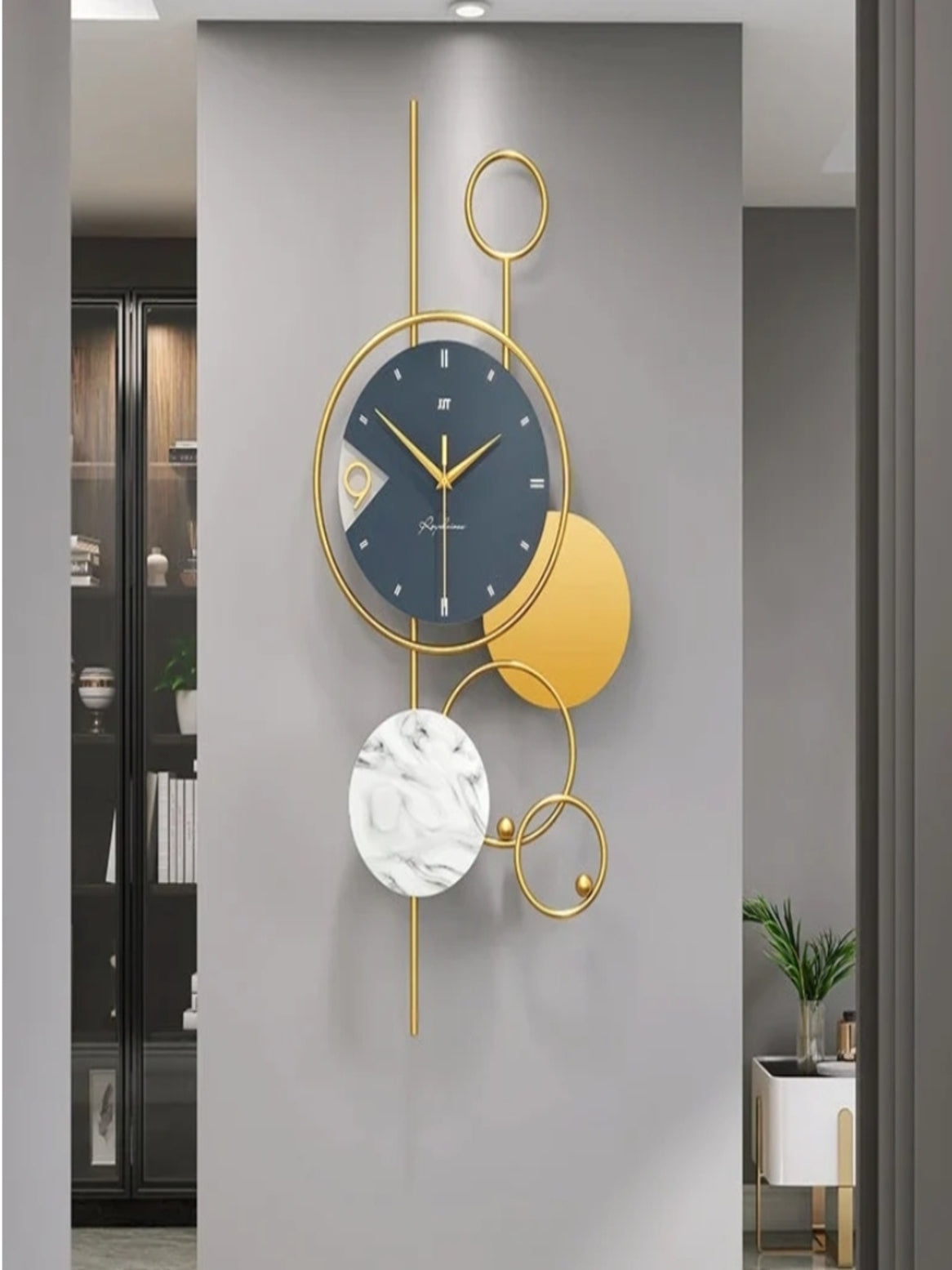 TOMYEUS Wall Clock (Likely a decorative, modern design) Metal Wall Clocks