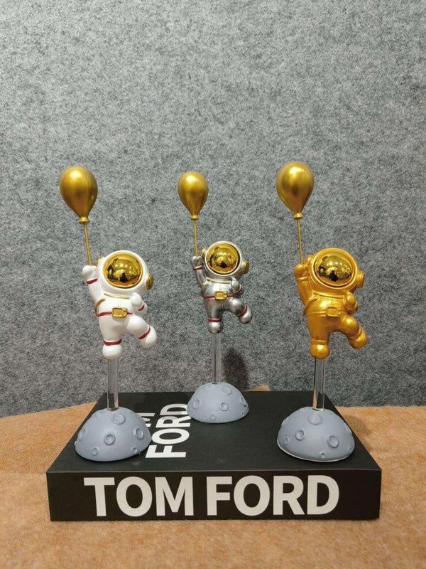 Artifacts Whimsical "Flying Astronaut with Balloon" Figurine Set - Modern Space Decor
