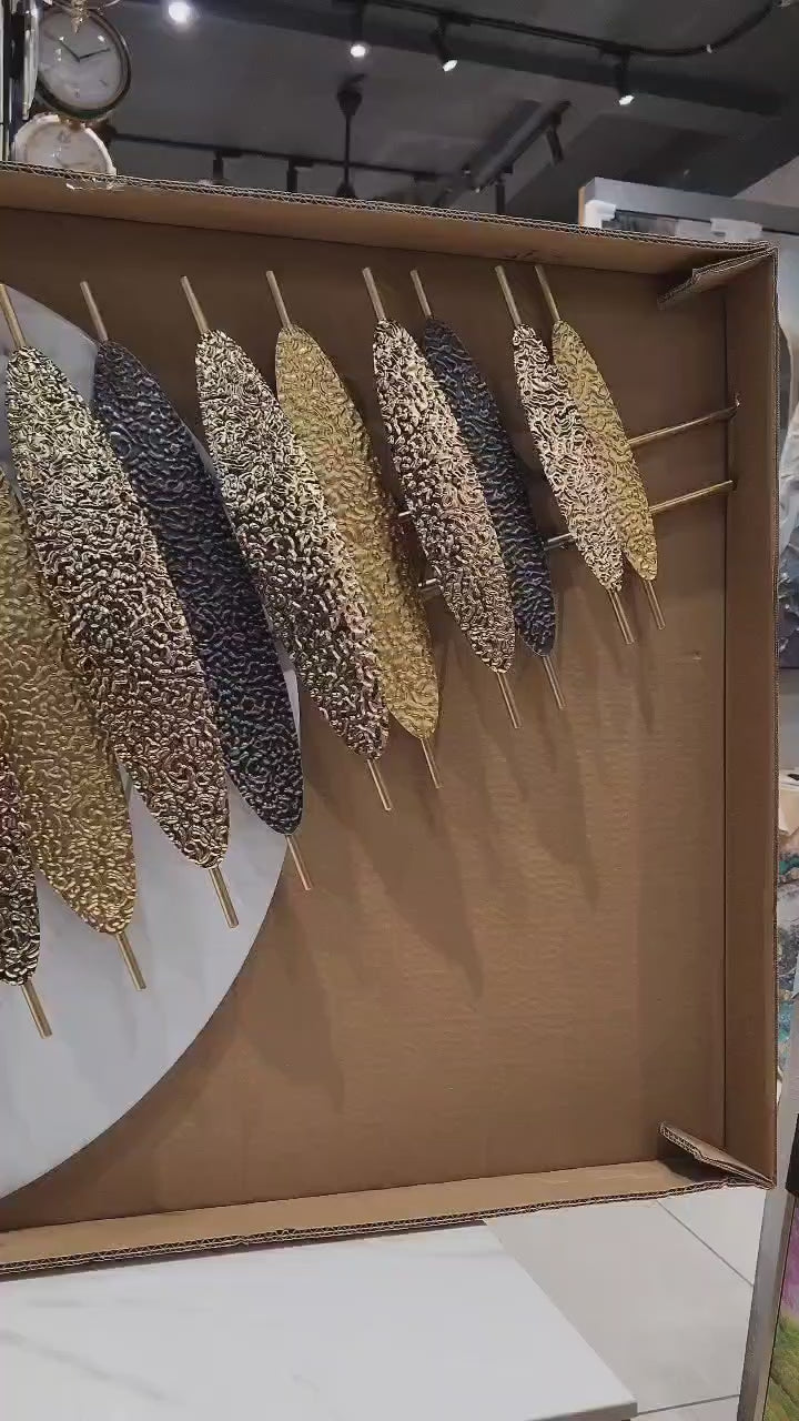 Gold and Black Metal Wall Art